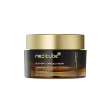 Load image into Gallery viewer, MEDICUBE Deep Vita C Capsule Cream is a potent brightening and nourishing cream infused with stabilized Vitamin C derivatives and Hippophae Rhamnoides Water to deliver intense hydration, improve skin tone, and enhance radiance. Enriched with Niacinamide, Alpha-Arbutin, and Ferulic Acid, this cream targets dullness, uneven skin tone, and pigmentation while supporting collagen production for firmer skin. Sodium Hyaluronate and Tocopherol (Vitamin E) deeply hydrate and protect the skin barrier, leaving your sk