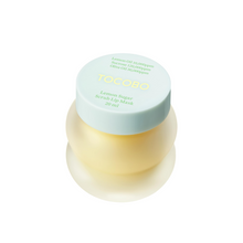 Load image into Gallery viewer, TOCOBO Lemon Sugar Scrub Lip Mask is a nourishing and exfoliating lip treatment designed to leave your lips soft and smooth. Infused with Lemon Peel Oil and Sucrose, this lip mask gently buffs away dead skin cells while hydrating and protecting the lips with Olive Fruit Oil and Hippophae Rhamnoides Fruit Oil. Its rich, nourishing formula also includes Tocopheryl Acetate (Vitamin E) to help maintain soft, supple lips. Ideal for use as an overnight treatment or as a quick scrub to achieve smooth, hydrated lip