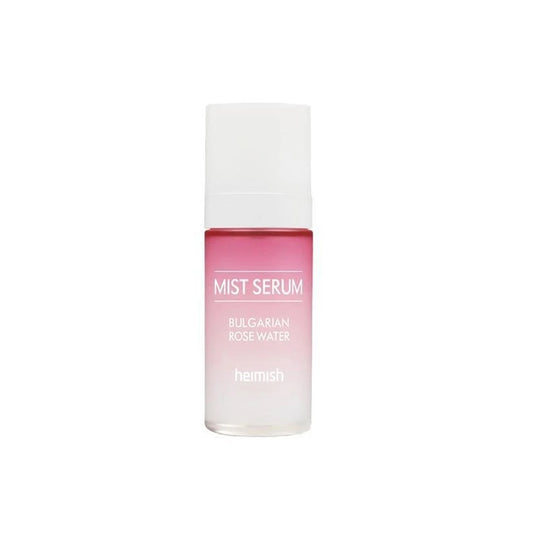 HEIMISH Bulgarian Rose Water Mist Serum is a hydrating and revitalizing mist perfect for all skin types. Formulated with Rosa Damascena Flower Water and Niacinamide, it provides deep hydration, brightens the skin, and improves elasticity. Enriched with botanical extracts like Portulaca Oleracea and Lotus Flower Extract, it soothes and calms irritation while Adenosine helps smooth fine lines. Lightweight and refreshing, this mist serum delivers an instant boost of moisture and radiance, leaving your skin sof