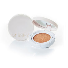 Load image into Gallery viewer, MISSHA Magic Cushion Cover Lasting delivers flawless, long-lasting coverage with a smooth, buildable formula. Enhanced with Niacinamide and Calendula Extract, it brightens and calms the skin, while lightweight silicones and soft-focus powders create an even, natural-looking finish. Enriched with Vitamin E and botanical extracts like Peppermint and Eucalyptus, this cushion keeps your skin hydrated and comfortable all day. Ideal for achieving a radiant and perfected complexion with ease.