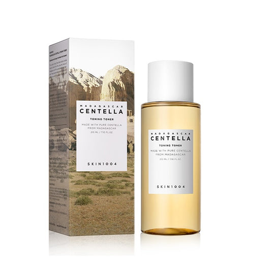 SKIN1004 Madagascar Centella Toning Toner is formulated with 84% Centella Asiatica Extract to soothe and calm the skin while providing gentle exfoliation and hydration. This toner includes Niacinamide for brightening and Gluconolactone to refine skin texture. It's designed to balance and tone the skin, making it an ideal addition to your skincare routine for achieving a clear and refreshed complexion.